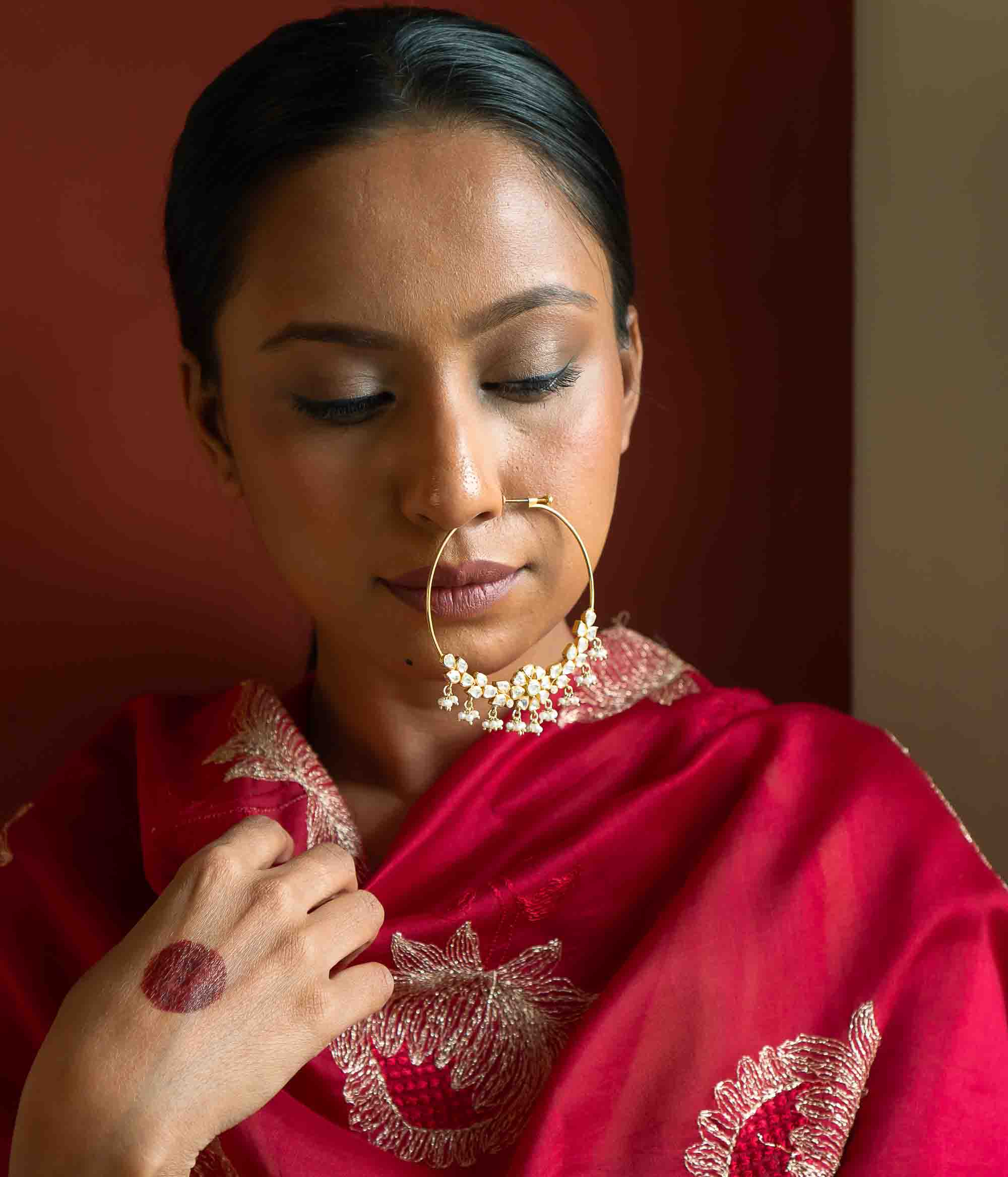 An Indian Bride is wearing a nose ring o... | Stock Video | Pond5